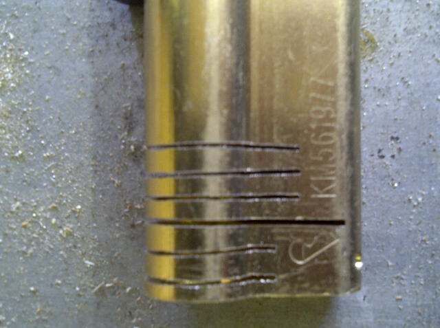 A UAP British Standard euro cylinder, disassembled and cutaway for practise